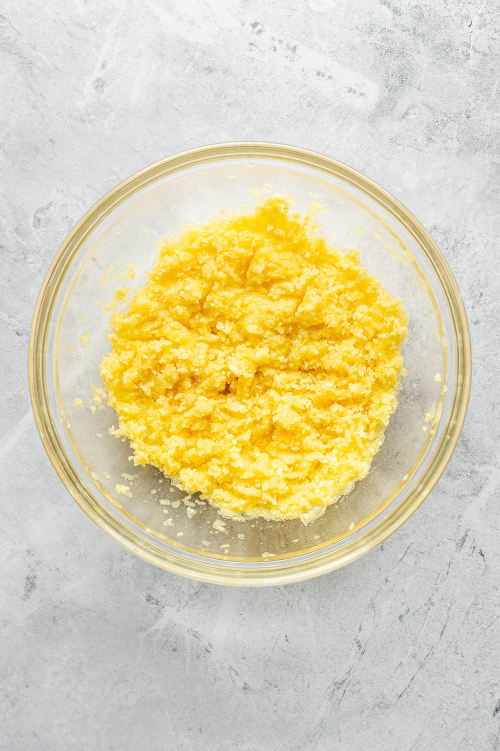 Overhead shot of a yellow-ish breadcrumb paste.