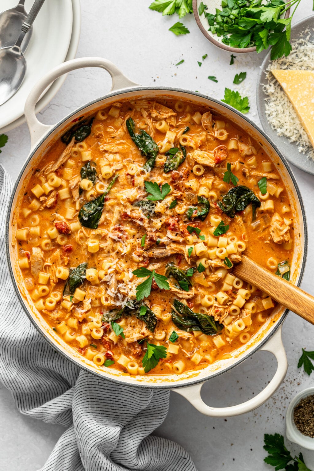 Marry me chicken soup in a large white pot.