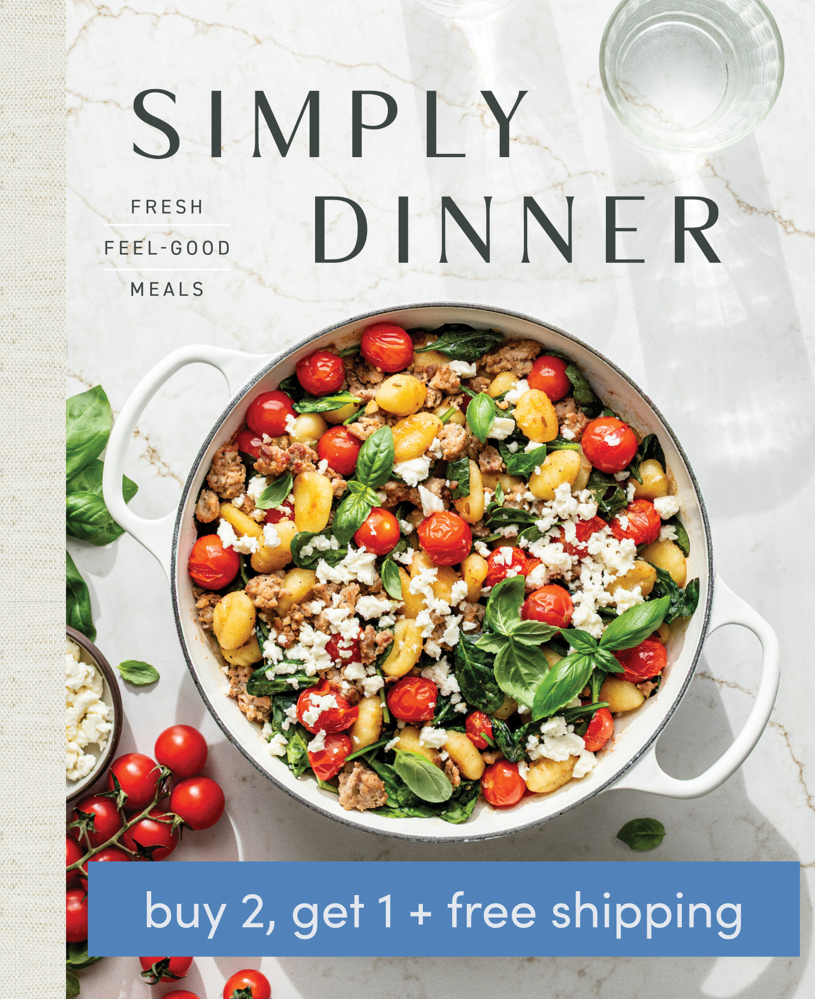 A pot of vegetable and cheese pasta on a white table, surrounded by fresh ingredients and a glass of water. Text reads SIMPLY DINNER and advertises a buy 2, get 1 free offer with free shipping.
